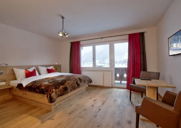 Chalet Dorfkristall Bramberg 2 persoonskamer met zithoek