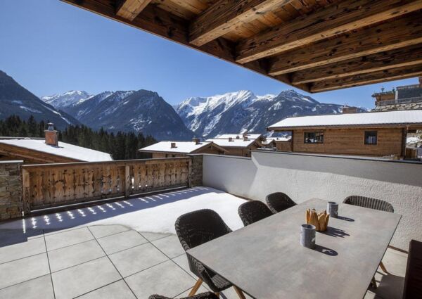 Nationalpark Chalet Dreiherrenspitze Neukirchen - 
<ul>
  <li>Directe toegang tot de piste en nabijheid van meerdere skigebieden.</li>
  <li>Eigen ontspanningsruimte met Finse sauna voor ultieme ontspanning na het skiën.</li>
  <li>Skiberging voor het drogen van ski's en skischoenen.</li>
</ul>