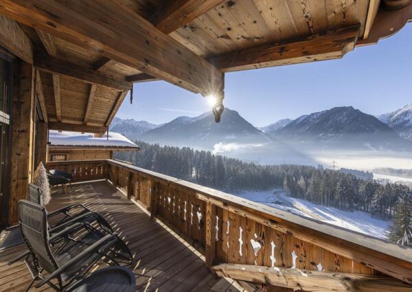 Nationalpark Chalet Gabelspitze Neukirchen - 
<ul>
  <li>Directe toegang tot de dalafdaling van het skigebied Wildkogel Arena en nabijheid van andere skigebieden zoals Zillertal Arena en Kitzbüheler Alpen.</li>
  <li>Ruime skiberging met skischoendroger en luxe wellnessfaciliteiten, inclusief een grote sauna met uitzicht.</li>
  <li>Kindvriendelijk skigebied met tal van winteractiviteiten zoals rodelen op 's werelds langste verlichte rodelbaan en fakkelwandelingen.</li>
</ul>