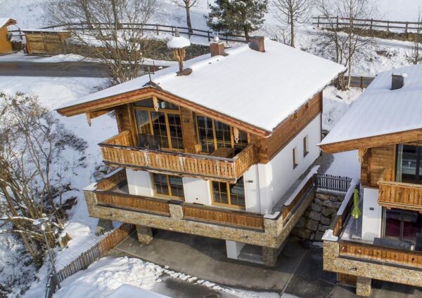 Nationalpark Chalet Grosser Hexenkopf Neukirchen - 
<ul>
  <li>Directe nabijheid van de dalafdaling van skigebied de Wildkogel Arena en gratis skibus naar skilift.</li>
  <li>Ruime berging met verwarmde skischoendroger en gezellige open haard.</li>
  <li>Carport met oplaadpunt voor elektrische auto's en goede bereikbaarheid van nabijgelegen skigebieden.</li>
</ul>