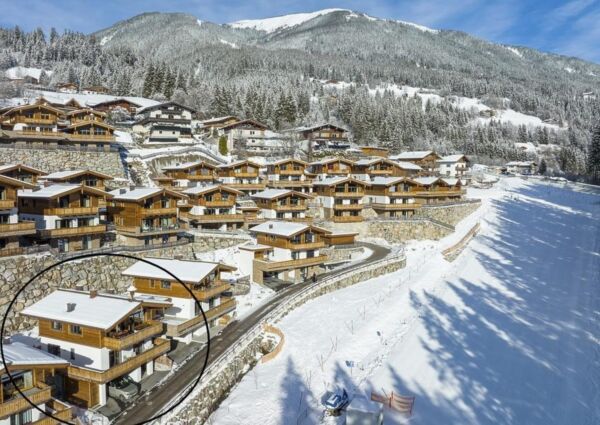 Nationalpark Chalet Kratzenberg Neukirchen - 
<ul>
  <li>Ski in & ski out faciliteiten met dal afdaling en sleeplift direct bij het chalet.</li>
  <li>Ontspanningsruimte met Finse sauna en openhaard voor ultieme après-ski ontspanning.</li>
  <li>Toegang tot diverse skigebieden zoals Wildkogel Arena, Zillertal Arena en Kitzbüheler Alpen.</li>
</ul>