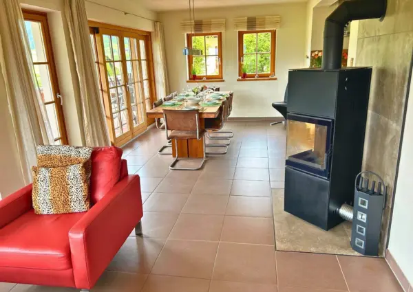 Panorama Chalet Lungau Mauterndorf woonkamer met open haard