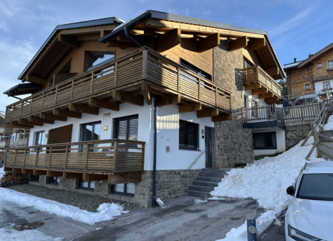 Snowfall parkeren voor de deur